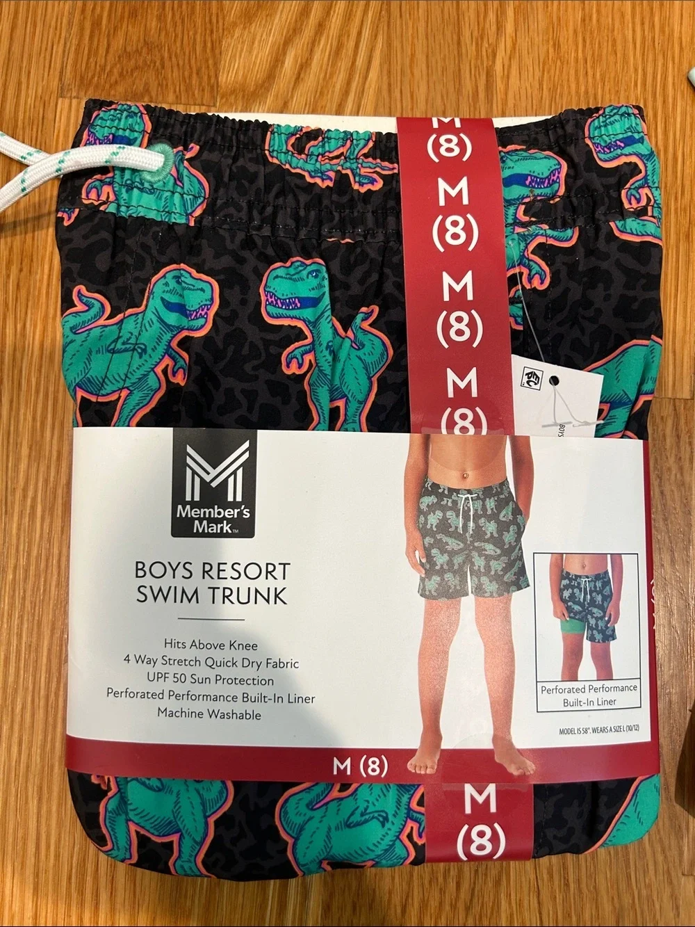 Member’s Mark Boys Resort Swim Trunk size 8 dinosaur black / flamingo blue print